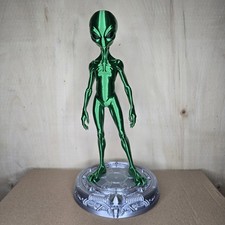 Listing image for Green alien figurine on a stand model Area 51 UFO space alien 24cm